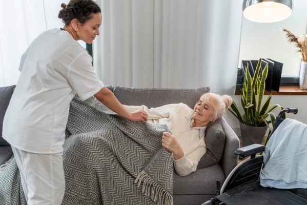 doctor-taking-care-senior-woman-home (1)